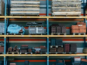 a shelf filled with lots of different types of bricks
