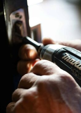 selective focus photography blue and black Makita power drill